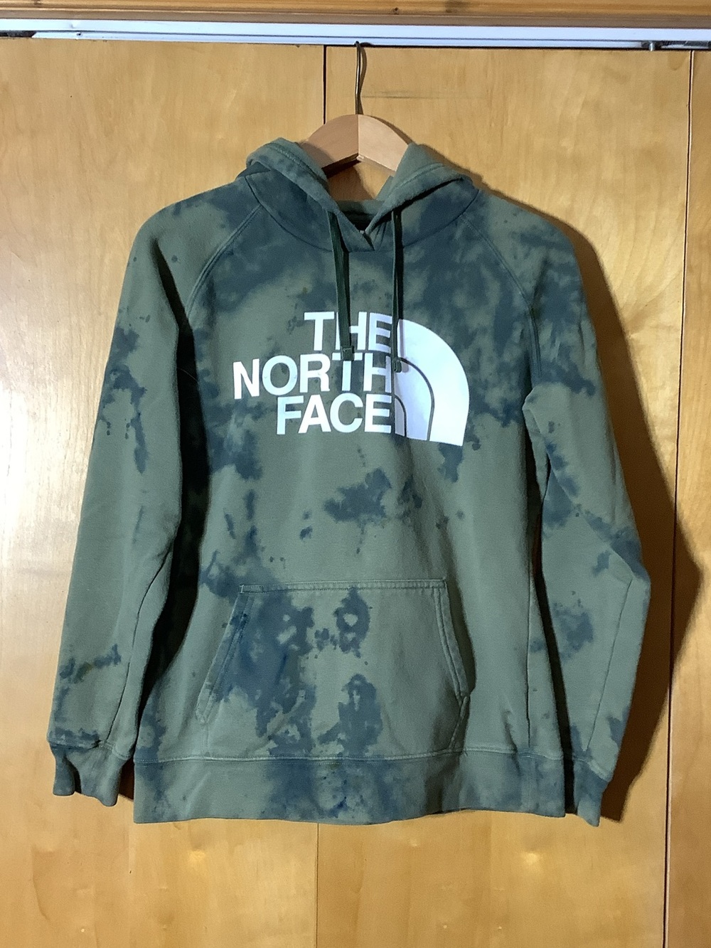 North Face green/yellow/pink/blue paint splotched hoodie, size medium